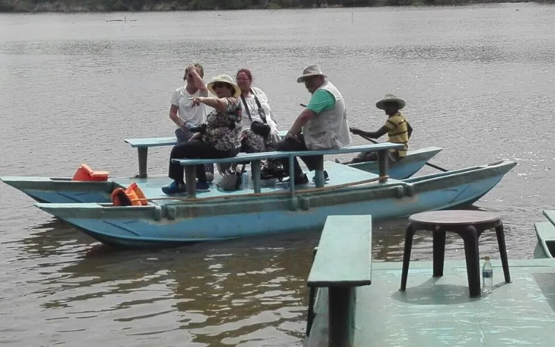 Accessible travellers on a calm lagoon boat outing on a Sri Lanka coastal tour